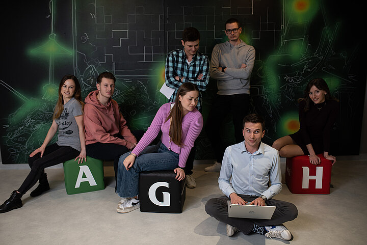 Seven AGH students posing for a photo.